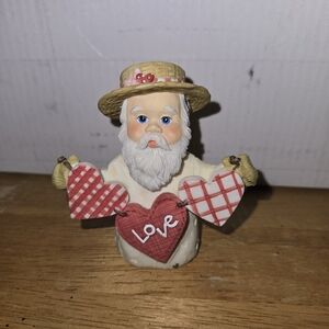 Charming Santa Figurine with Heart Accents